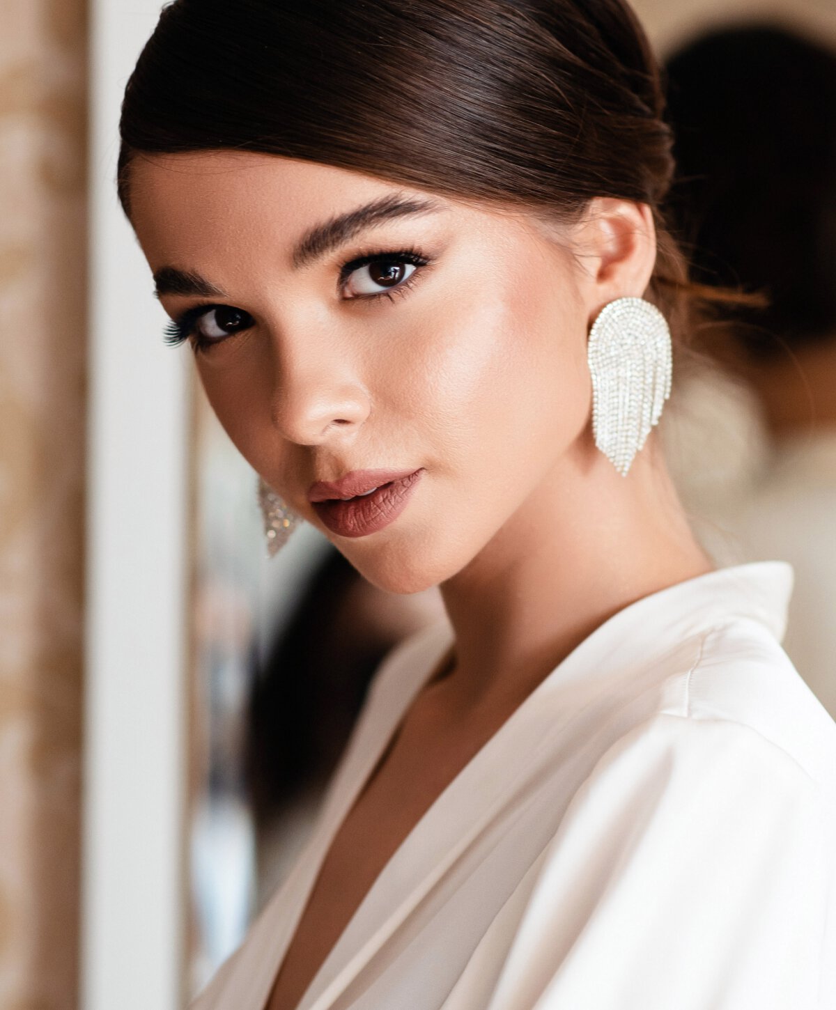 Petaluma lip filler model with brown hair